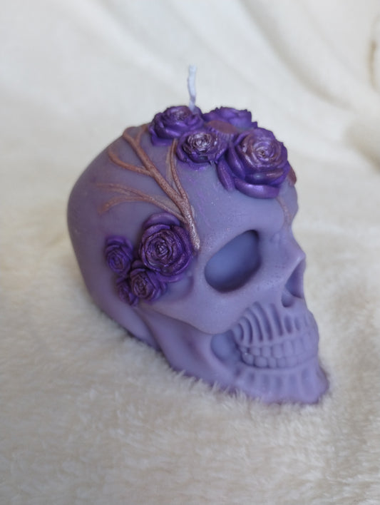 Floral skull candle with hand‑detailed texture, handmade in Sioux Falls, SD.