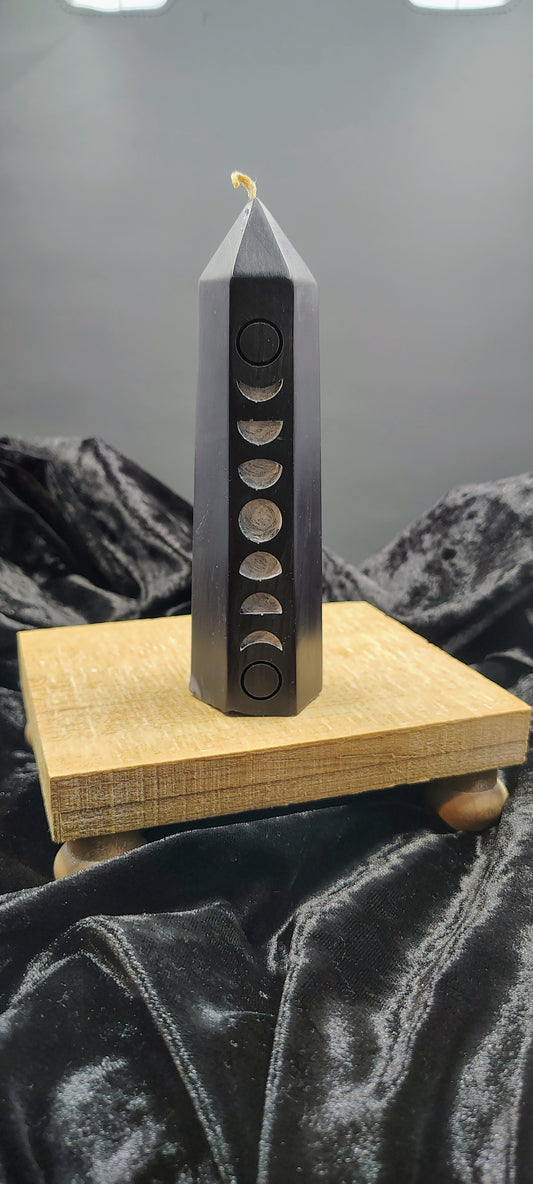 6‑inch moon phase tower candle with carved lunar design, handmade in Sioux Falls, SD.