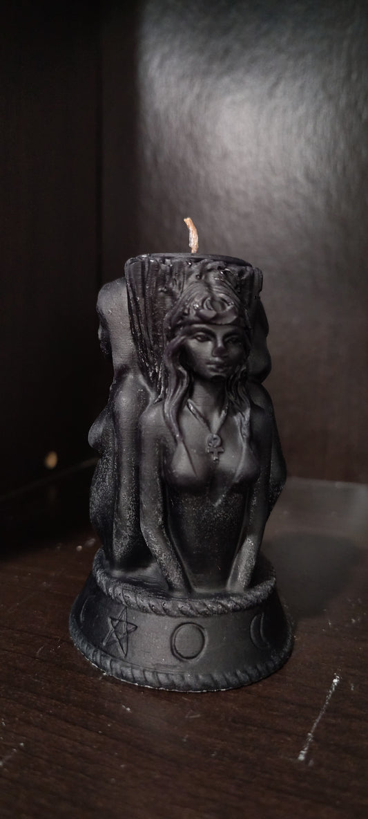 Triple Goddess sculptural candle showing Maiden, Mother, and Crone figures, handmade in Sioux Falls, SD.