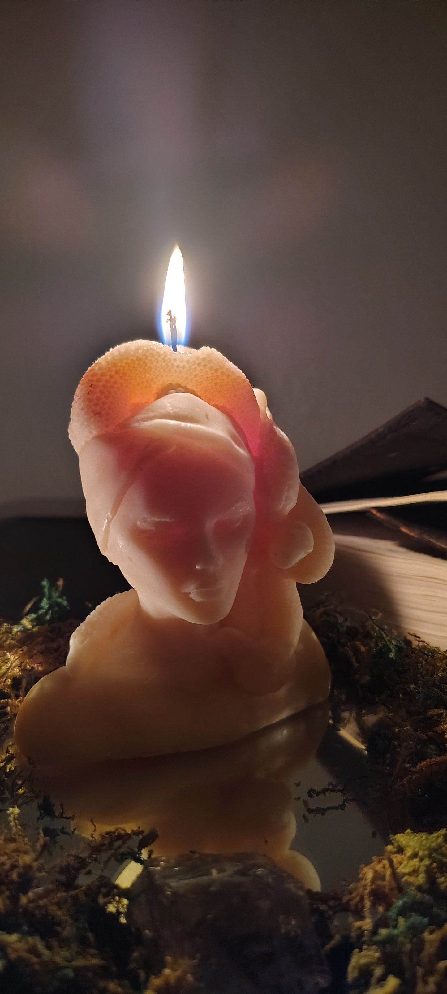 Hand‑poured Medusa bust candle with sculptural detailing, made in Sioux Falls, SD.