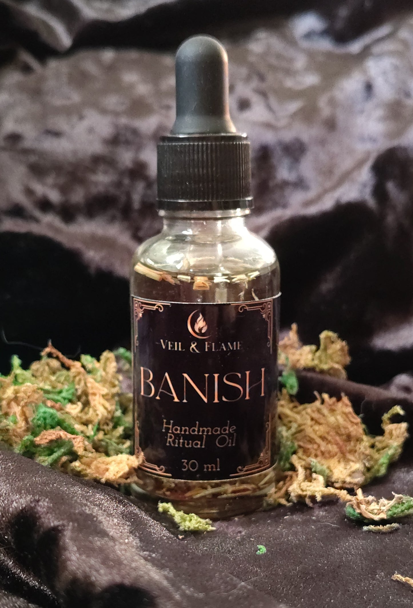 Banish Ritual Oil in a small glass bottle, crafted for release and boundary‑setting.