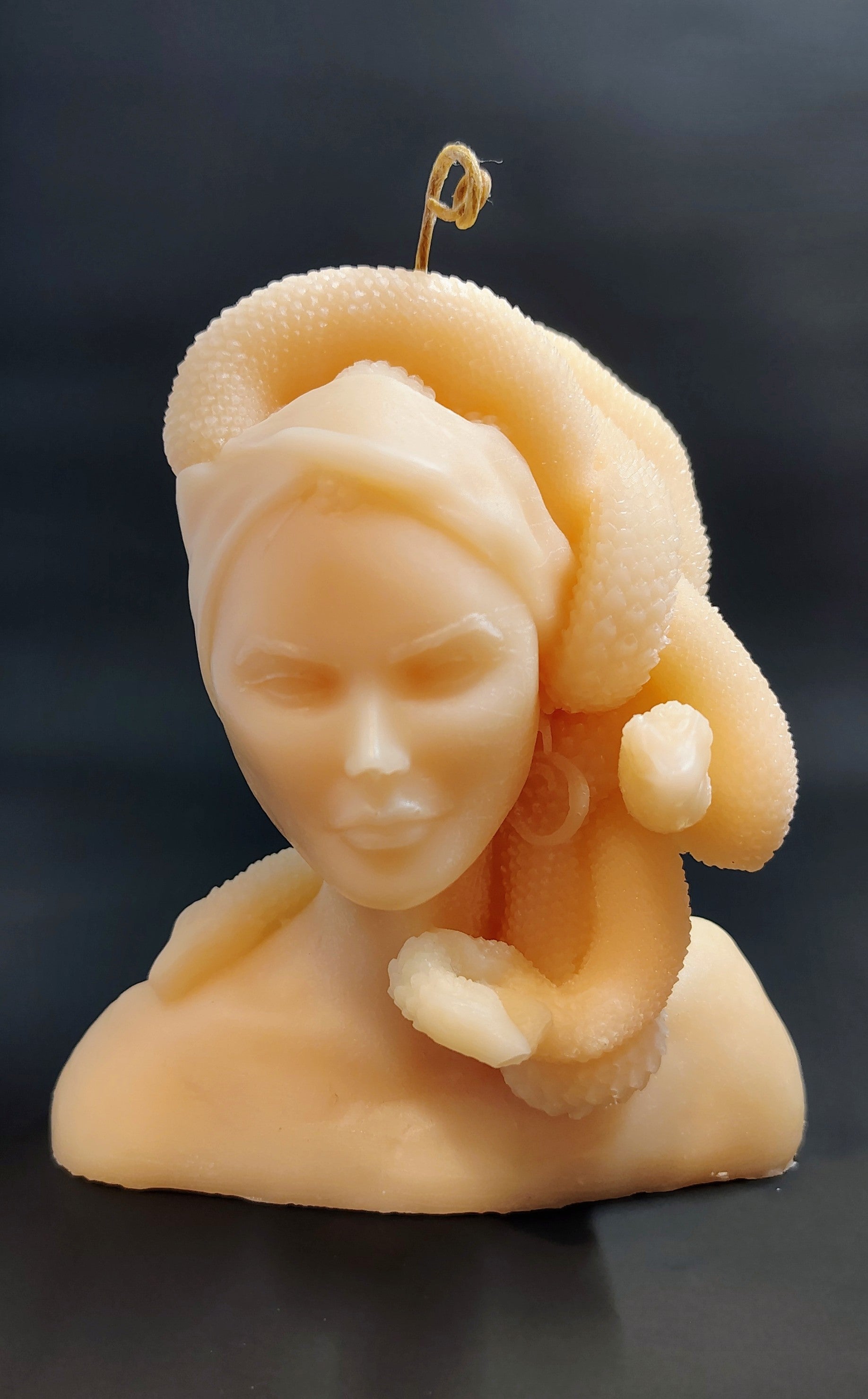 Hand‑poured Medusa bust candle with sculptural detailing, made in Sioux Falls, SD.
