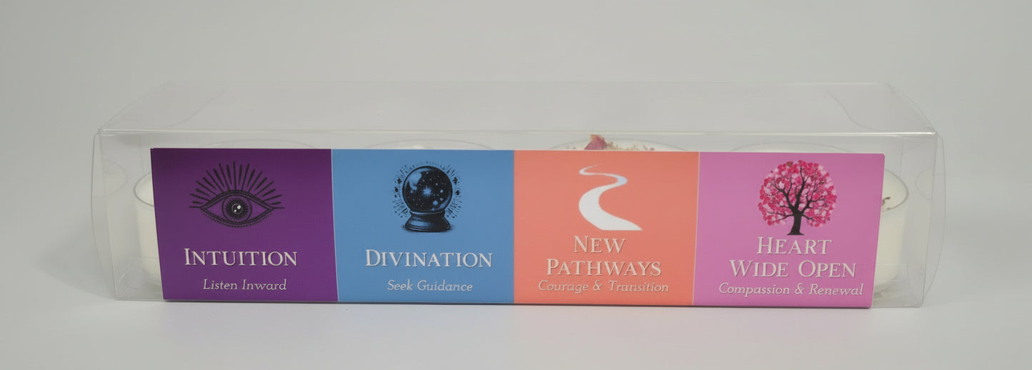 Packaged tea lights with colorful labels on a white surface
