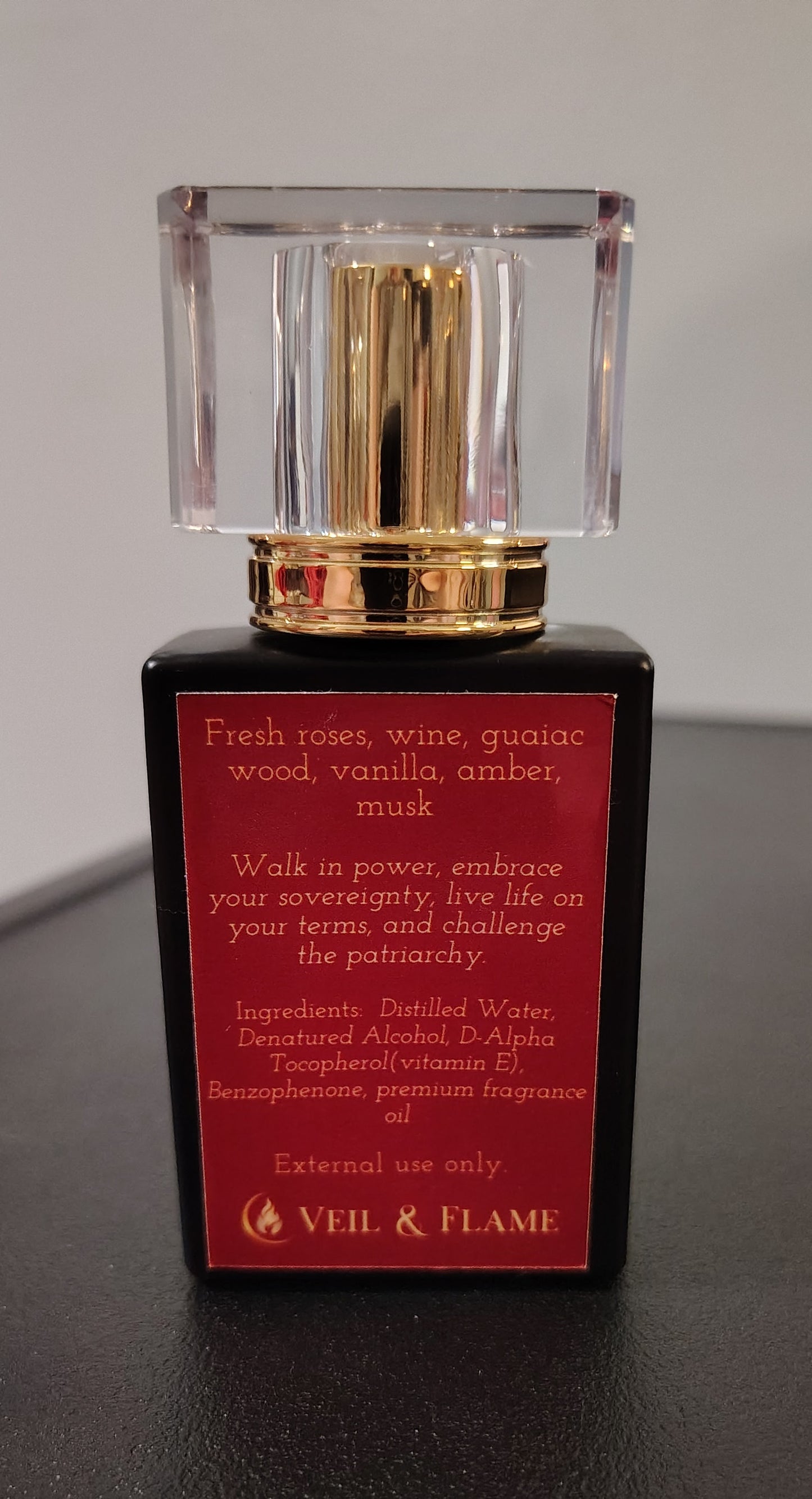 Lilith’s Embrace perfume in a 1 oz glass bottle, handcrafted in Sioux Falls, SD with dark feminine scent notes.