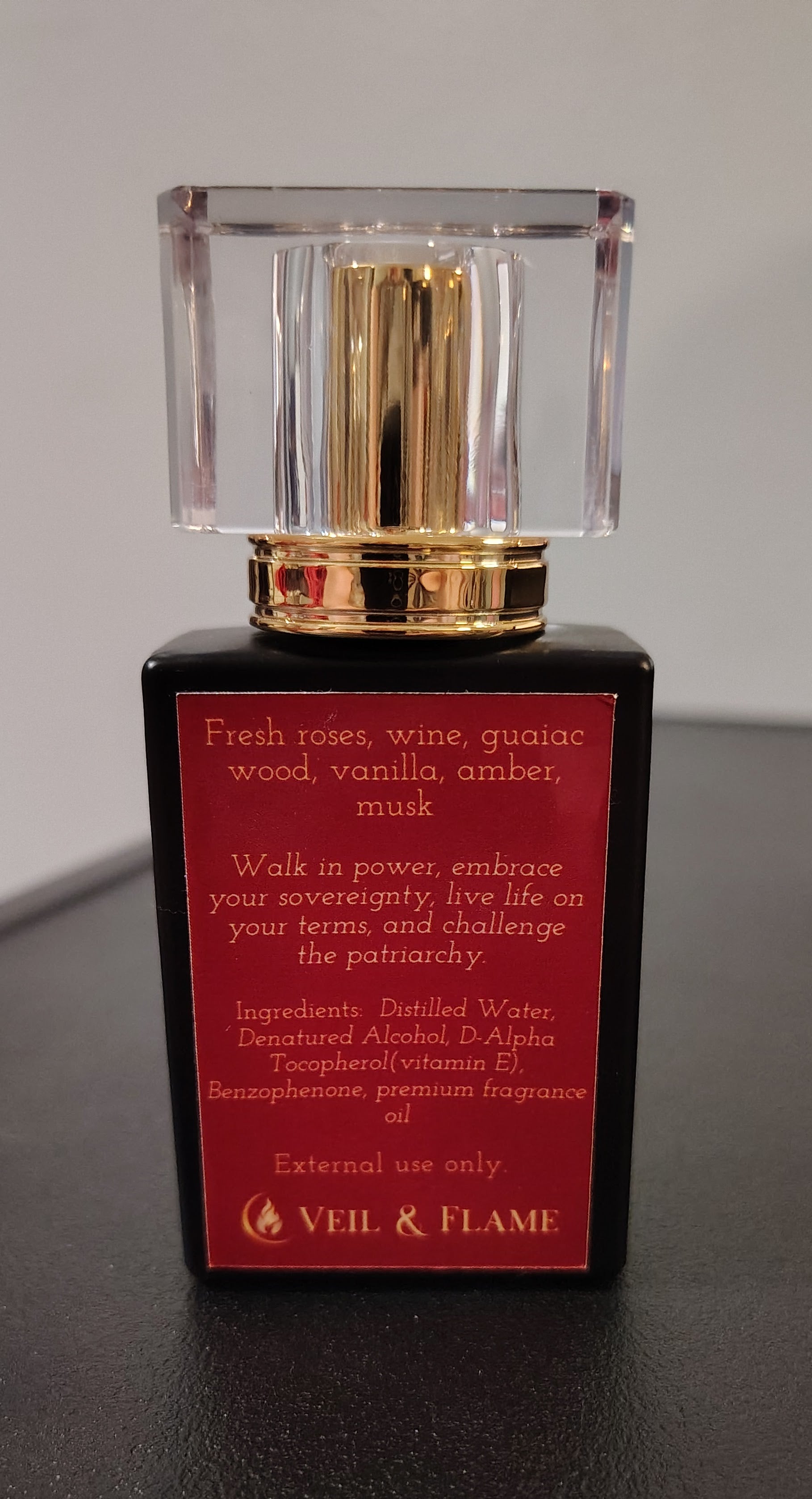 Lilith’s Embrace perfume in a 1 oz glass bottle, handcrafted in Sioux Falls, SD with dark feminine scent notes.