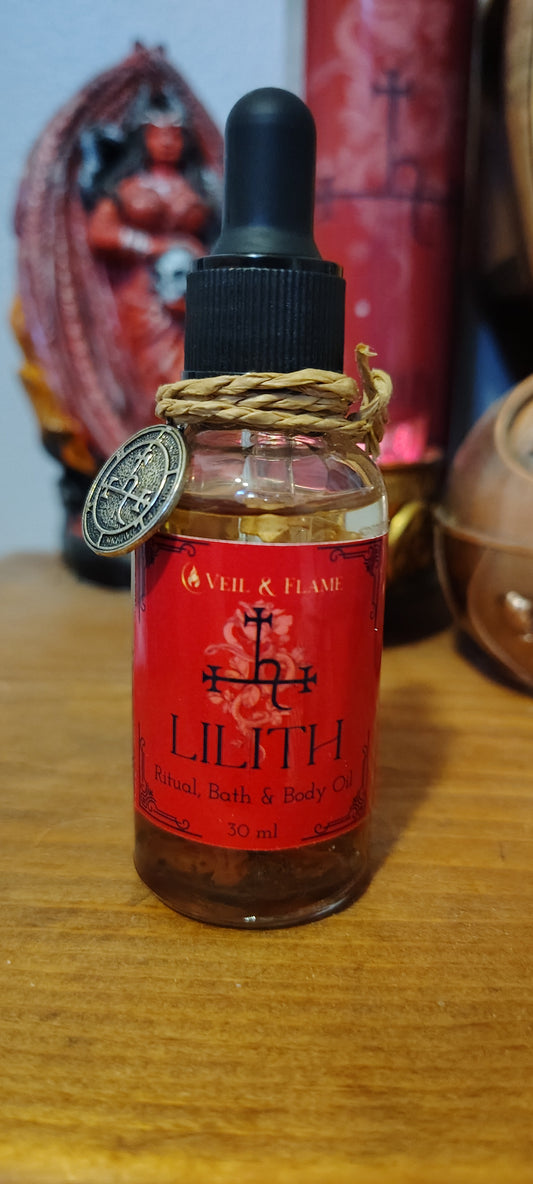Lilith ritual oil with dragon’s blood, rose petals, and herbs in a 1 oz dropper bottle.