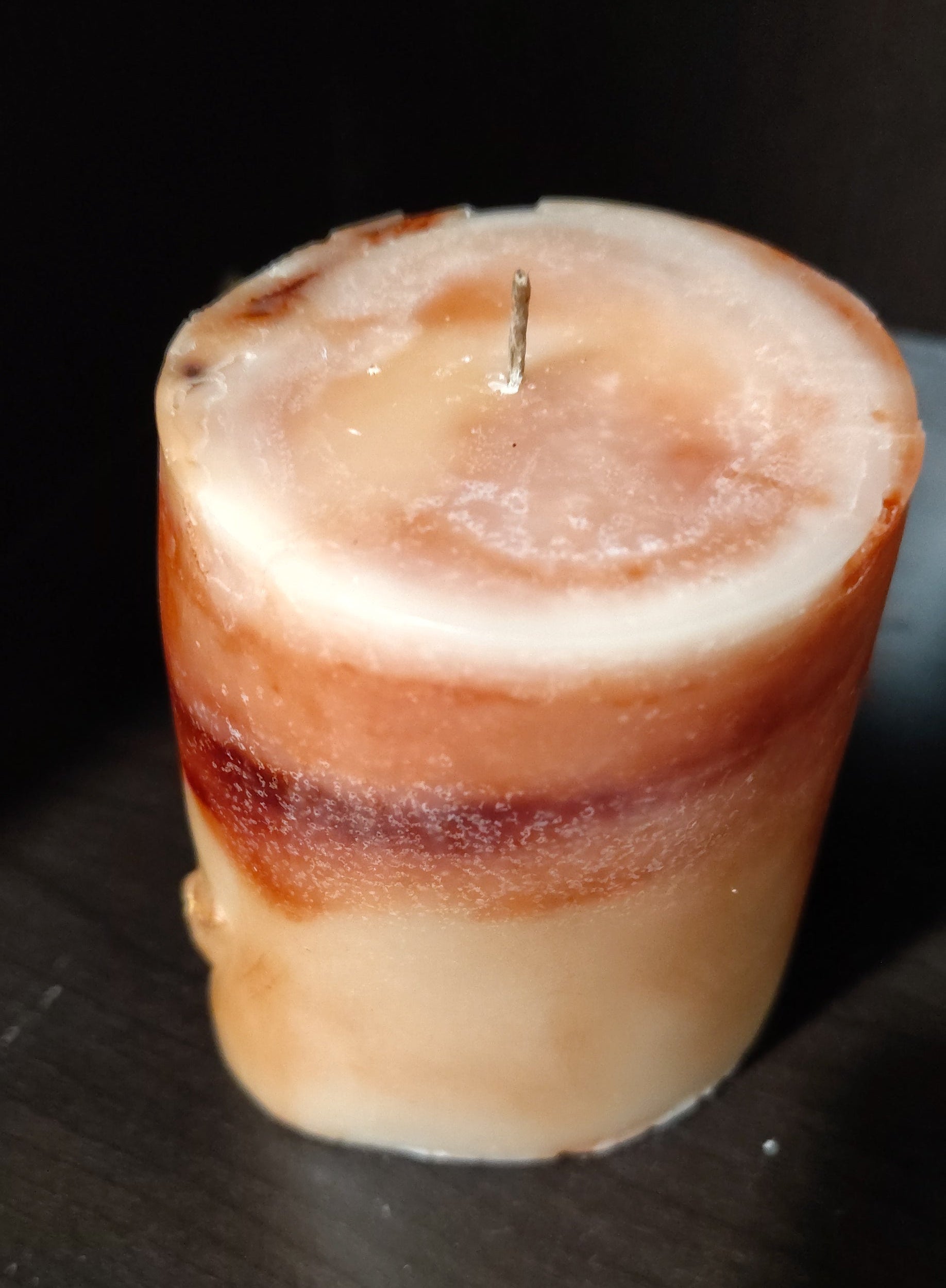 Sculptural moon‑themed feminine figure candle with marbled wax and gold detailing, handmade in Sioux Falls, SD.