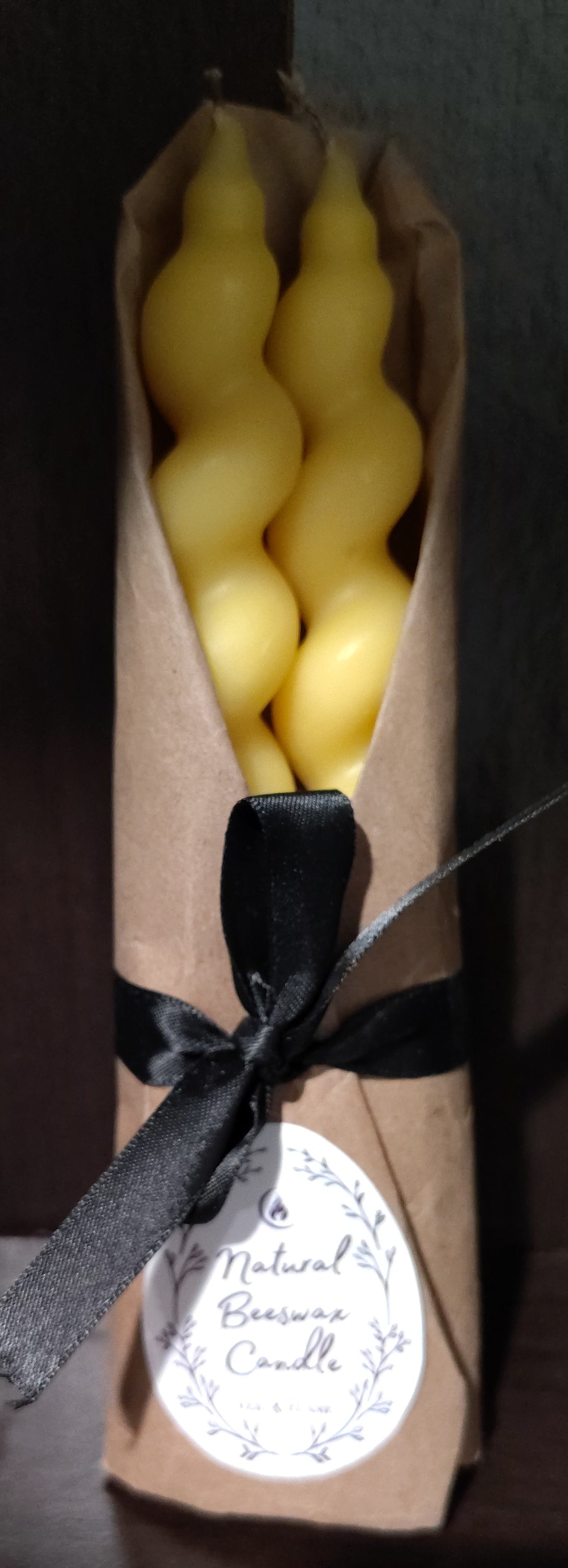 Pure beeswax candles in taper, chime, and Sun/Moon designs, hand‑poured in Sioux Falls, SD.