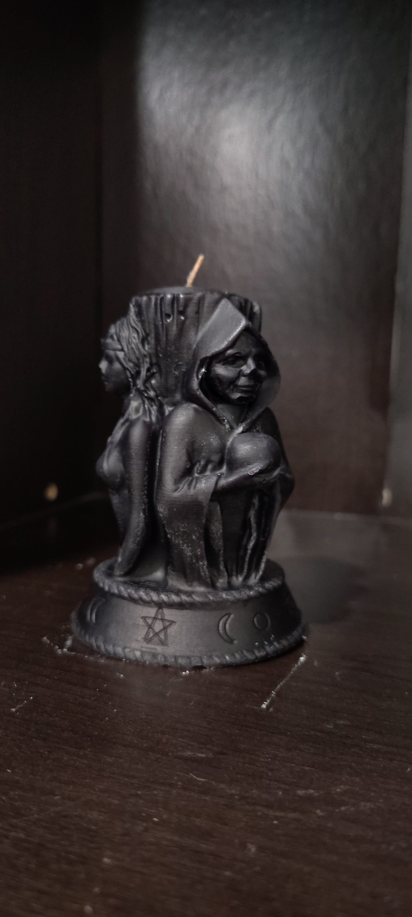 Triple Goddess sculptural candle showing Maiden, Mother, and Crone figures, handmade in Sioux Falls, SD.