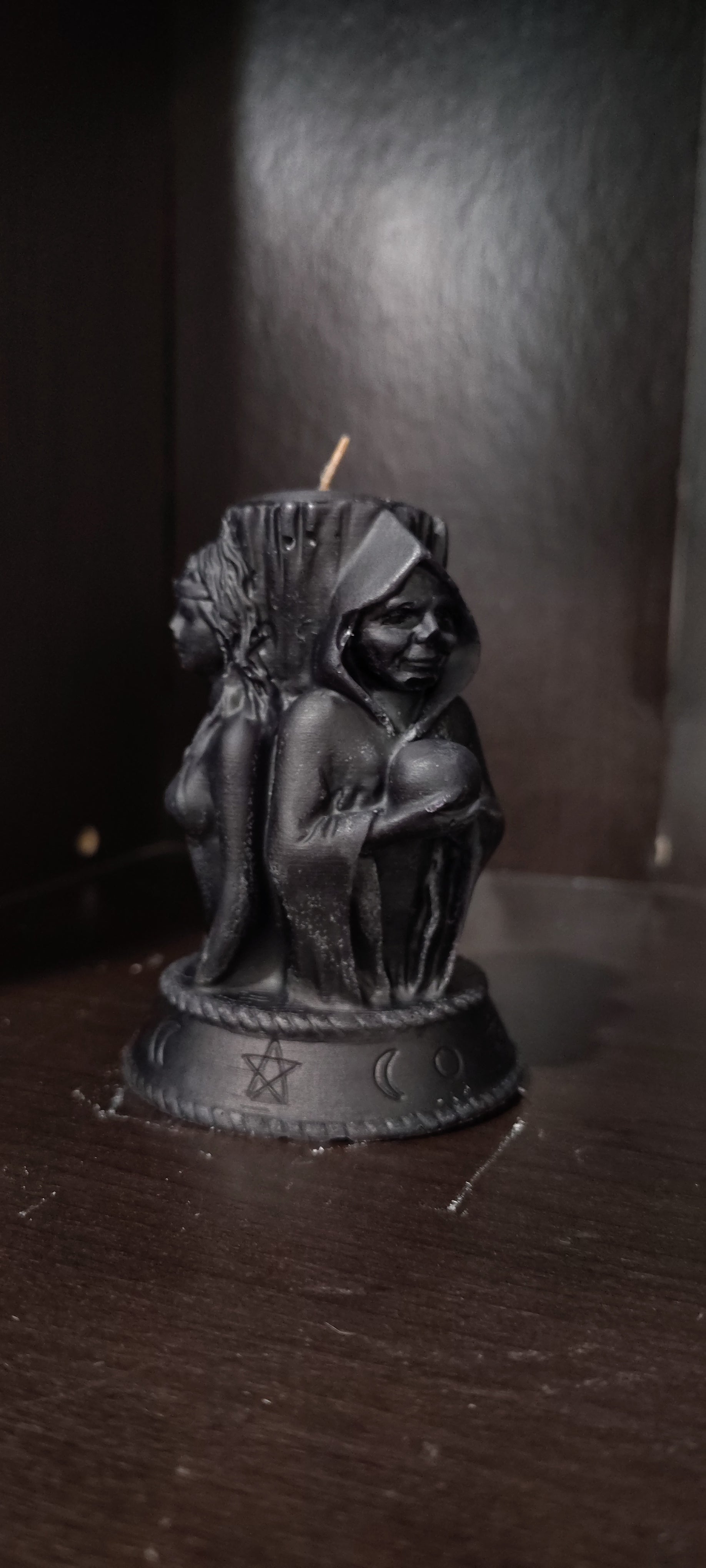 Triple Goddess sculptural candle showing Maiden, Mother, and Crone figures, handmade in Sioux Falls, SD.