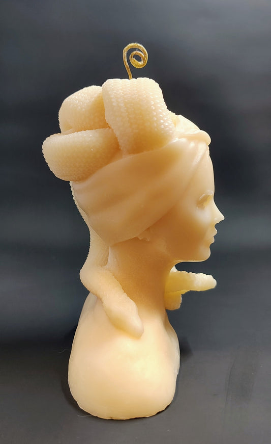 Hand‑poured Medusa bust candle with sculptural detailing, made in Sioux Falls, SD.