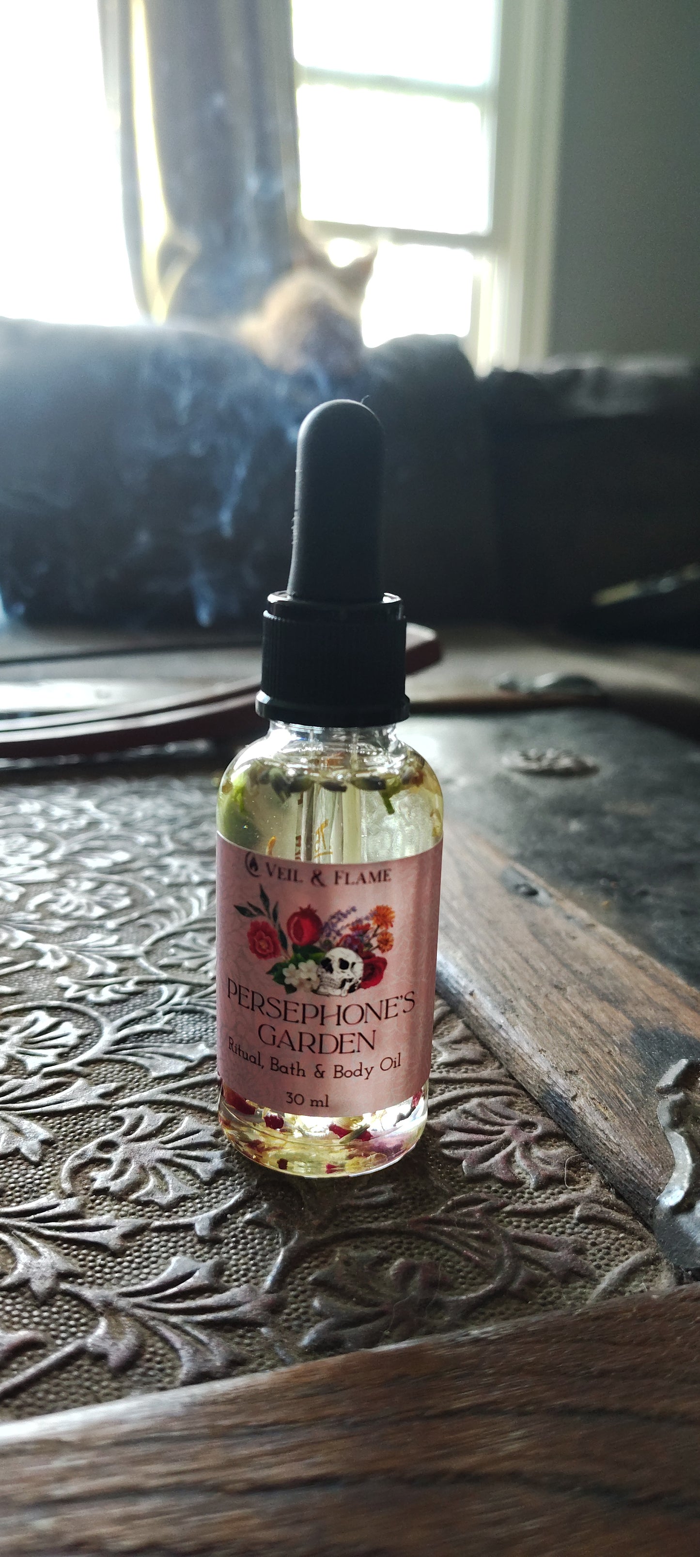 Persephone’s Garden ritual oil with floral botanicals in a 30 ml dropper bottle, handmade in Sioux Falls, SD.