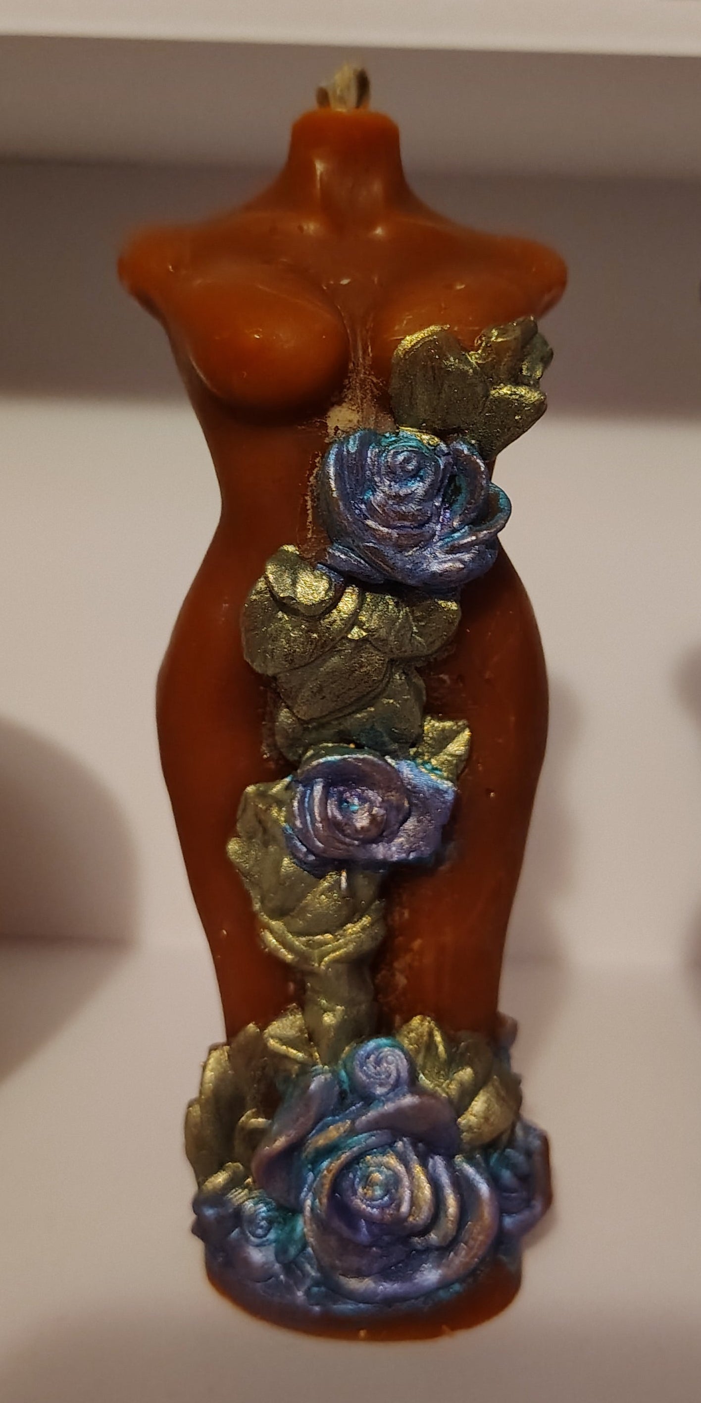 Decorative item with floral designs on a white background