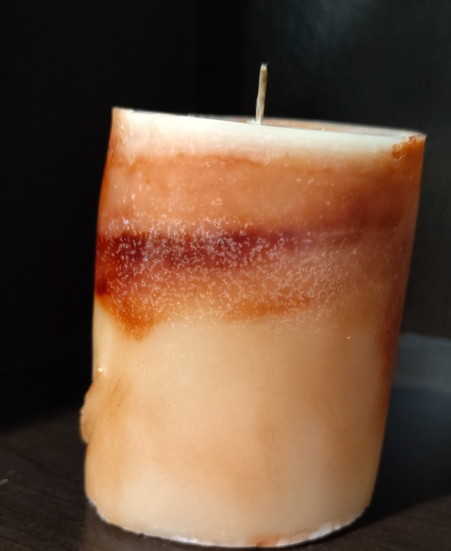 Sculptural moon‑themed feminine figure candle with marbled wax and gold detailing, handmade in Sioux Falls, SD.