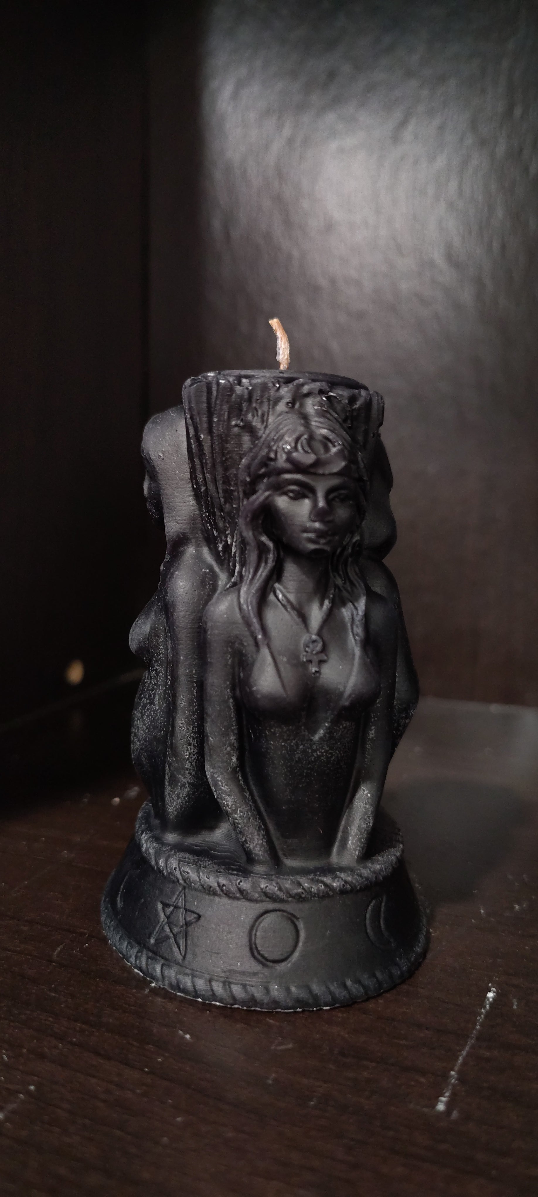 Triple Goddess sculptural candle showing Maiden, Mother, and Crone figures, handmade in Sioux Falls, SD.