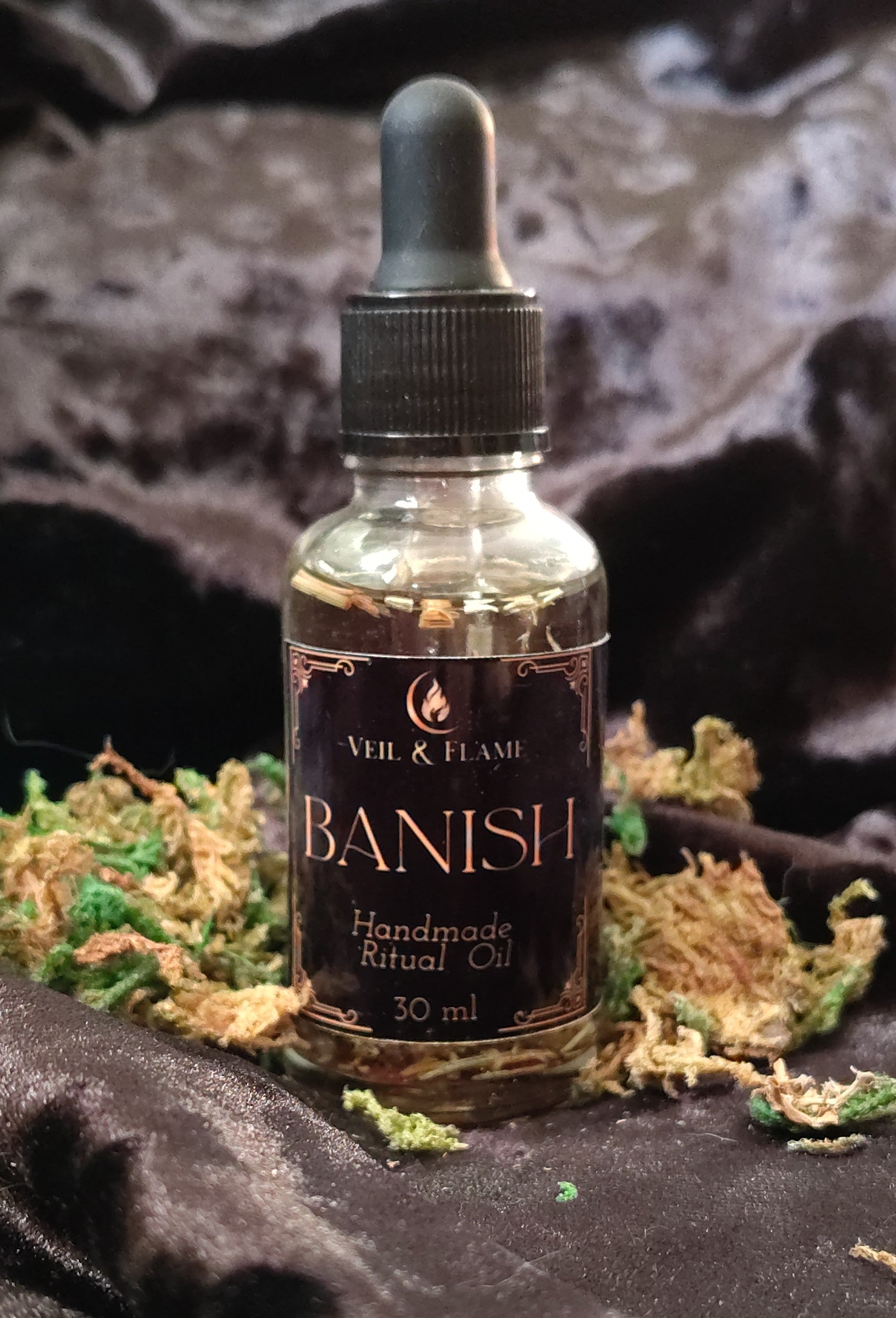 Banish Ritual Oil in a small glass bottle, crafted for release and boundary‑setting.